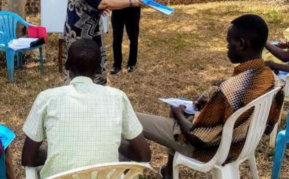 Handing-out-workbooks-1